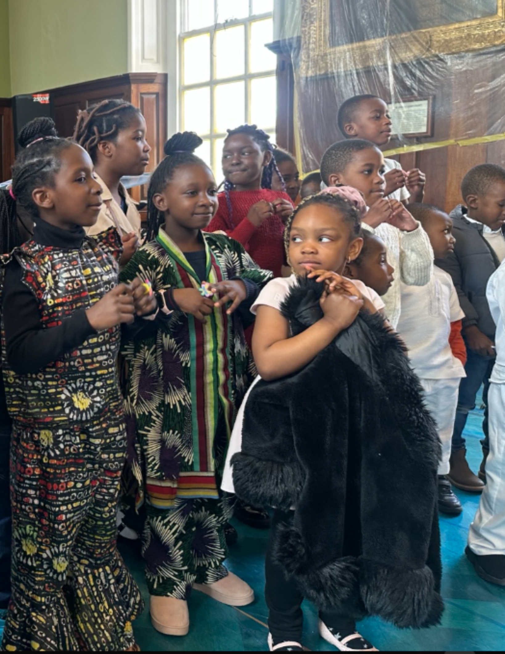 Children taking part in a colourful church celebration
